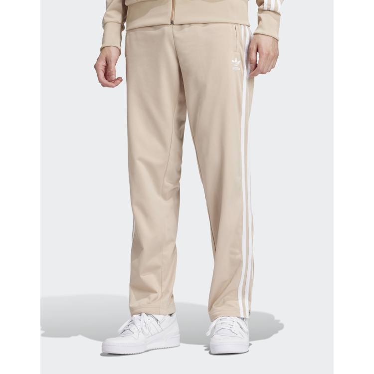 adidas Originals- Firebird Trainingsbroek in beige ASOS