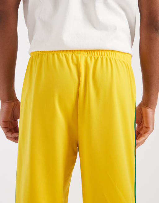 adidas Originals – Firebird – Trainingshose in Gelb und Grün, 5 von 5