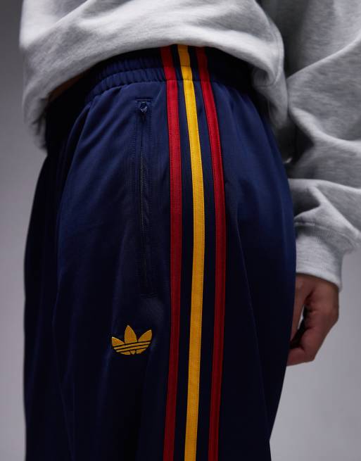 adidas Originals – Firebird – Trainingshose in Marineblau und Gelb, 5 von 5