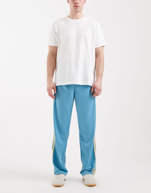 adidas Originals – Firebird – Trainingshose in Preloved-Blau und Orange, 2 von 5