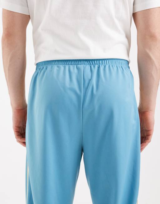 adidas Originals – Firebird – Trainingshose in Preloved-Blau und Orange, 5 von 5