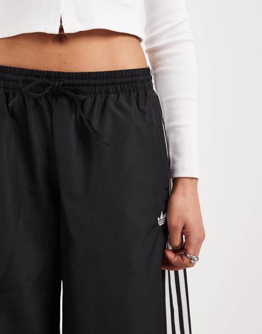 adidas Originals – Firebird – Trainingshose in Schwarz und Weiß mit weitem Schnitt, 2 von 5