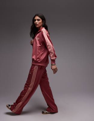 adidas Originals - Firebird - Trainingshose in Wunderrot mit lockerem Schnitt, exklusiv bei ASOS