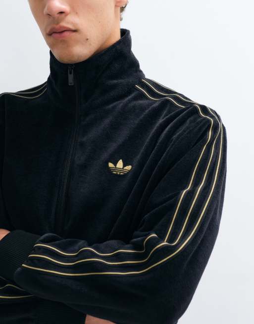 adidas Originals firebird velour track top in black | ASOS