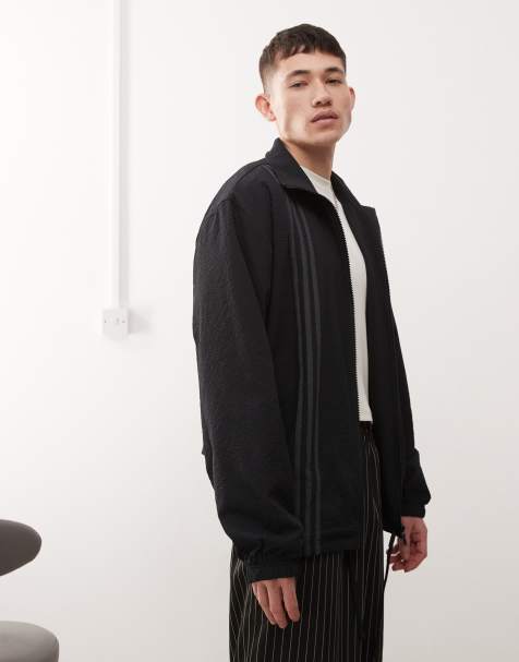 adidas Originals Firebird vertical 3-stripe track top in black - view 1