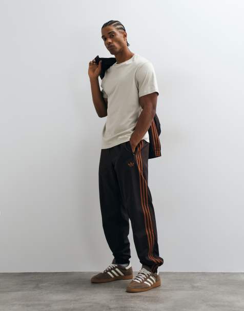 adidas Originals firebird woven track pants in brown