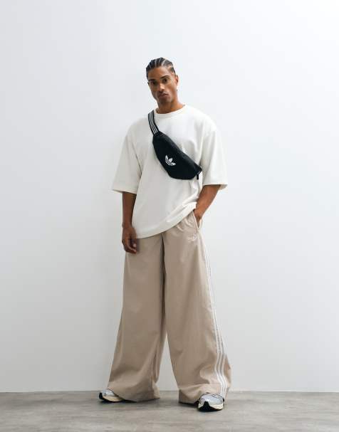 adidas Originals Firebird woven track pants in light khaki - view 1