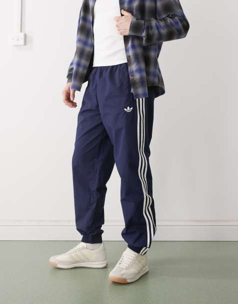 adidas Originals Firebird woven track pants in blue