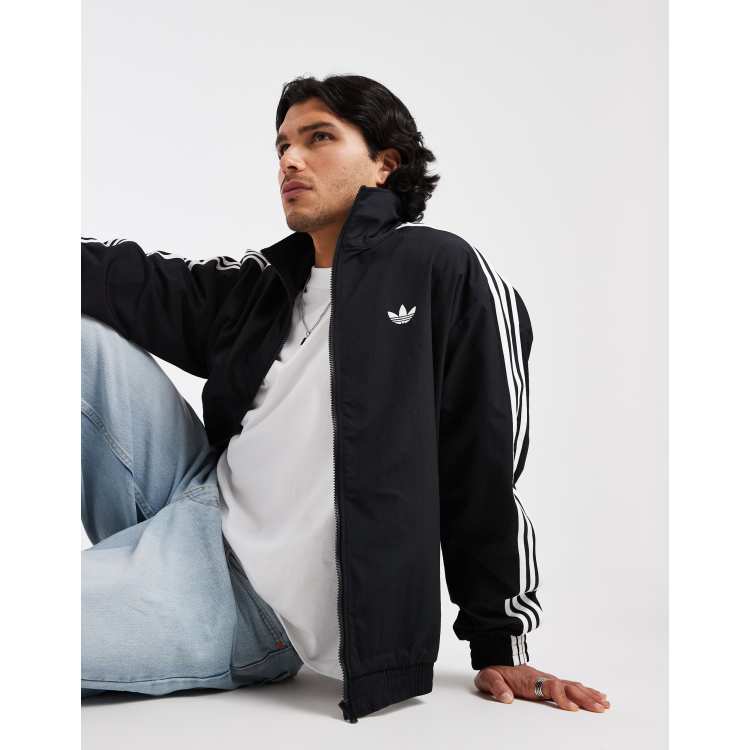 adidas Originals firebird woven track top in black | ASOS