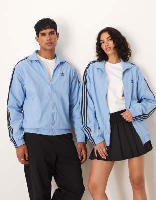 adidas Originals Firebird woven track top in blue | ASOS