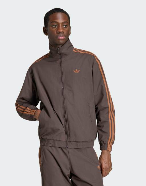 adidas Originals Firebird woven track top in branch | ASOS