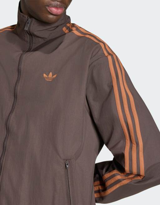 adidas Originals Firebird woven track top in branch | ASOS