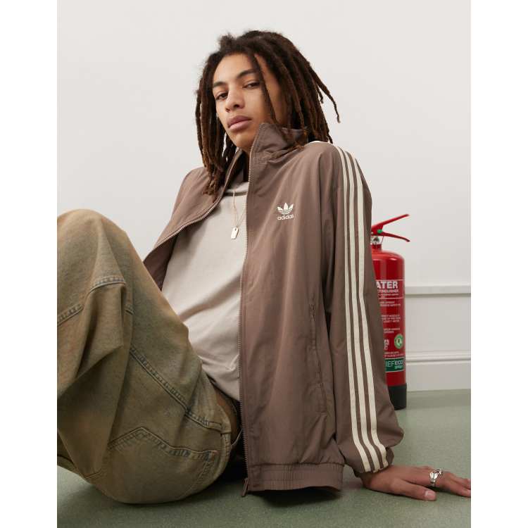 adidas Originals Firebird woven track top in brown | ASOS