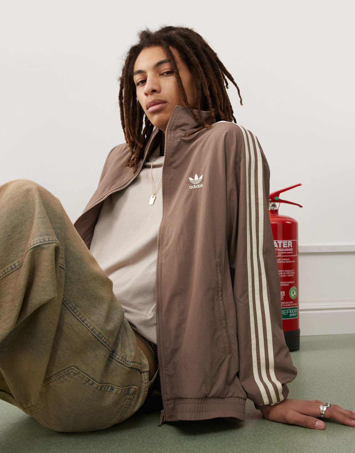 adidas Originals Firebird woven track top in brown