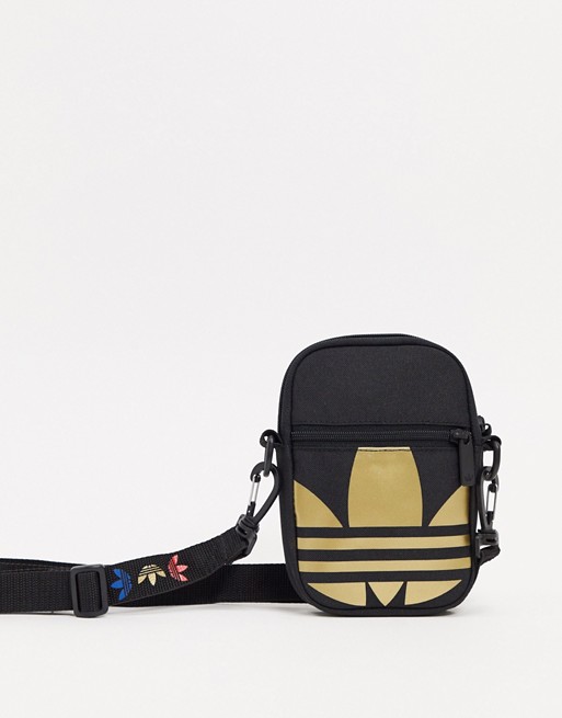 adidas Originals flight bag with large metallic trefoil in black