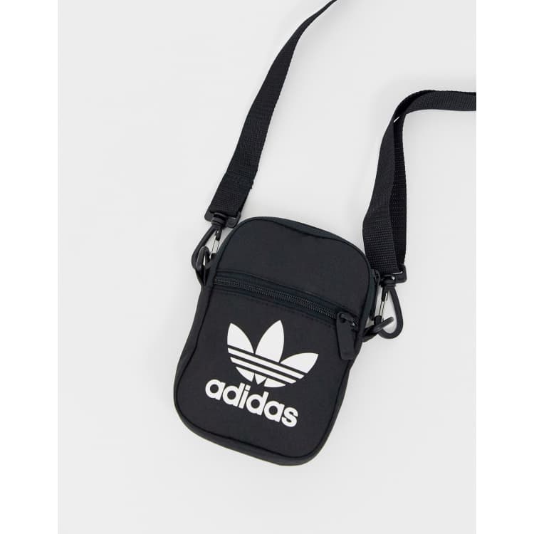 adidas Originals flight bag with trefoil logo in black ASOS