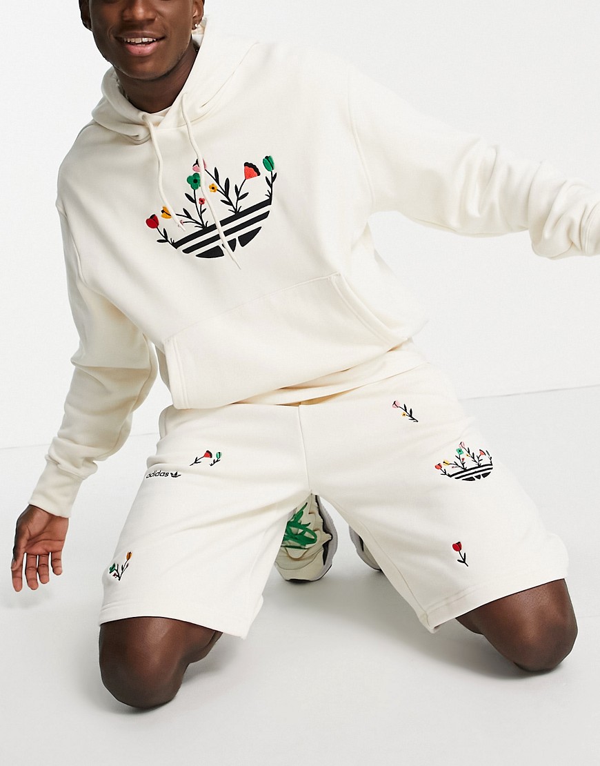 adidas Originals floral trefoil embroidered shorts in off white