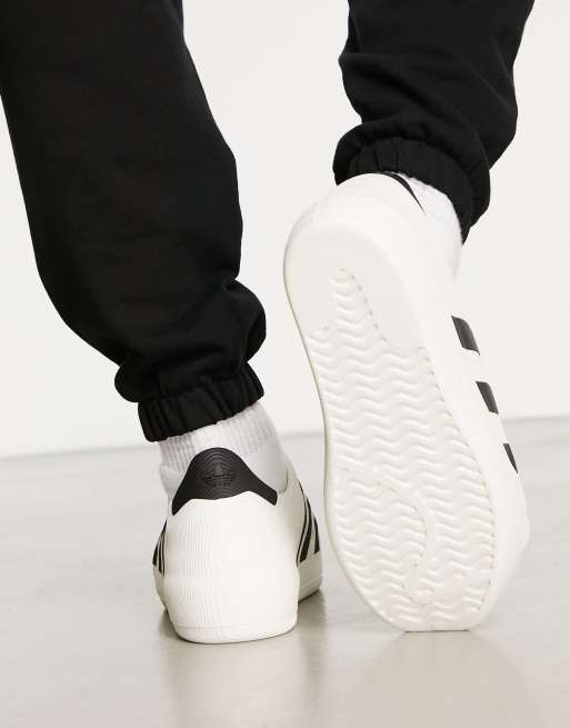 Adidas originals white on sale slip on superstar sneakers