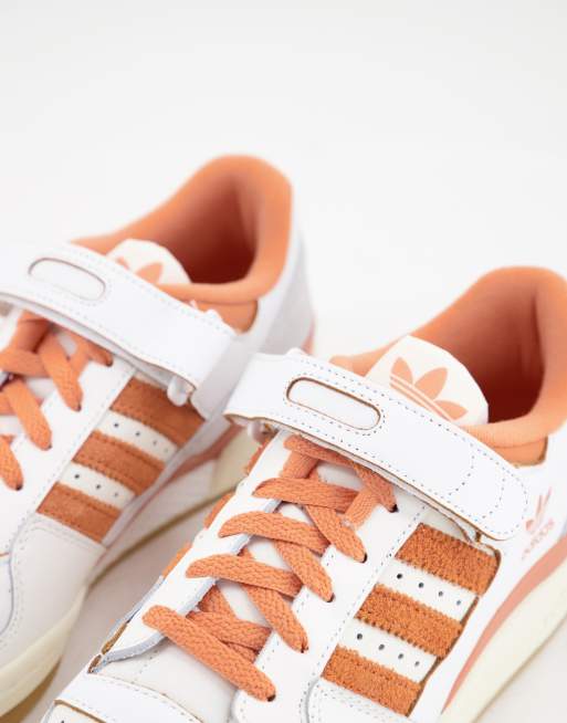 Adidas blanche store et orange