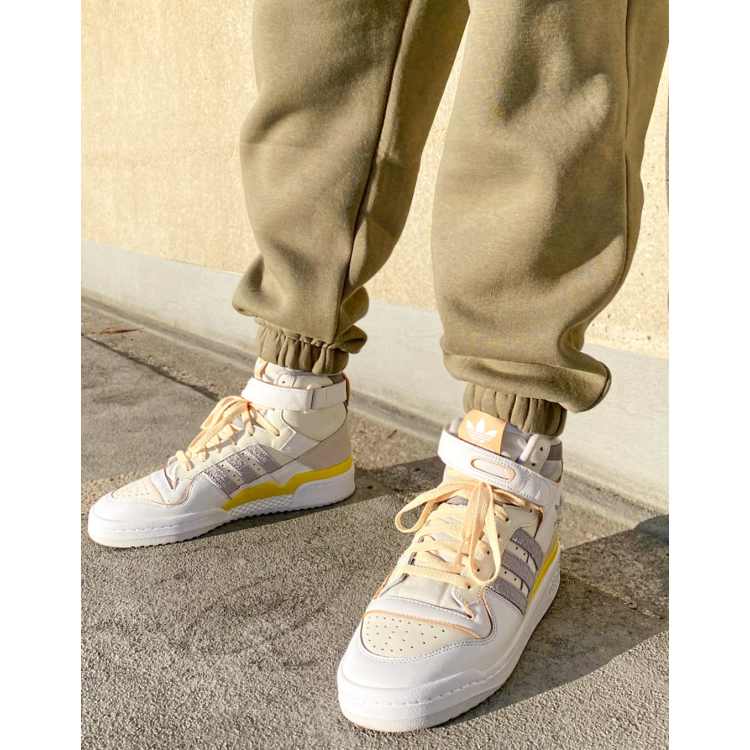 adidas Originals Forum 84 Hi trainers in white with grey and yellow details