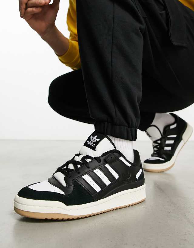 adidas Originals Forum 84 Low gum sole sneakers in black