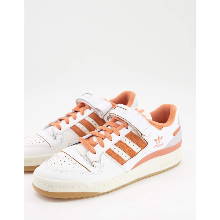 adidas Originals Forum 84 Low sneakers in white and orange | ASOS
