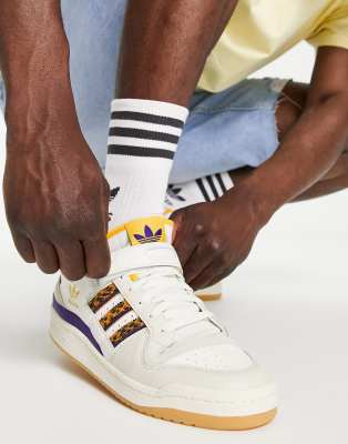 adidas Originals Forum Low trainers in gold and purple | ASOS