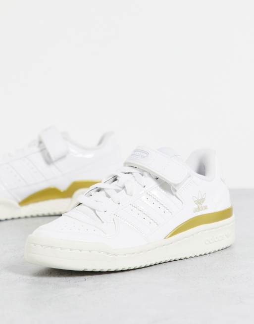 adidas Originals - Forum - Lage sneakers van lakleer in wit en goud