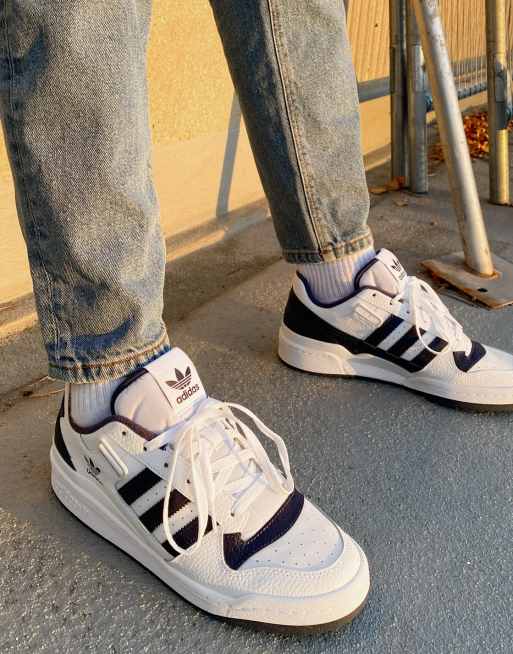 Originals Forum Low sneakers in white and navy | ASOS