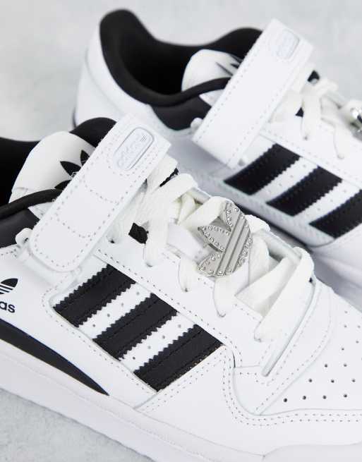 adidas Originals Forum low sneakers in white with black stripes