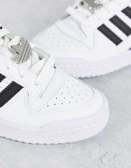 Zapatillas adidas blancas 2025 con lineas negras