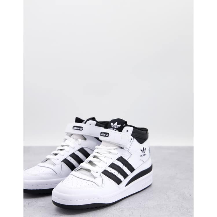 adidas Originals Forum Mid trainers in white and black