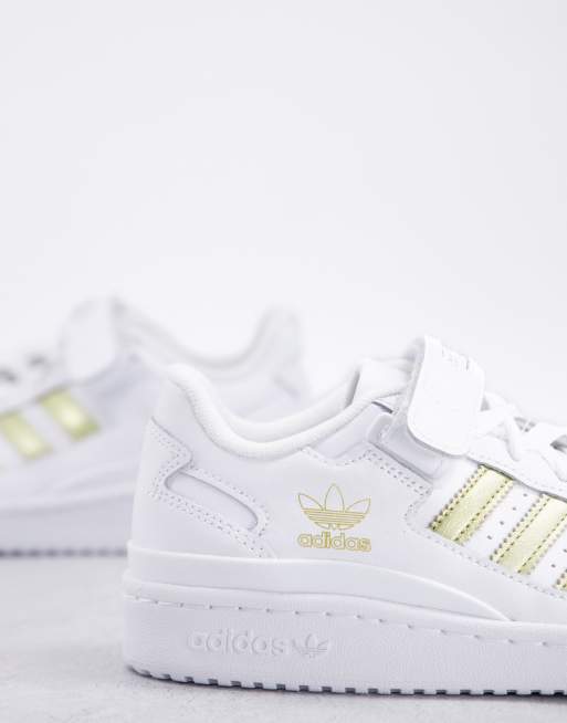 Adidas con store strisce oro