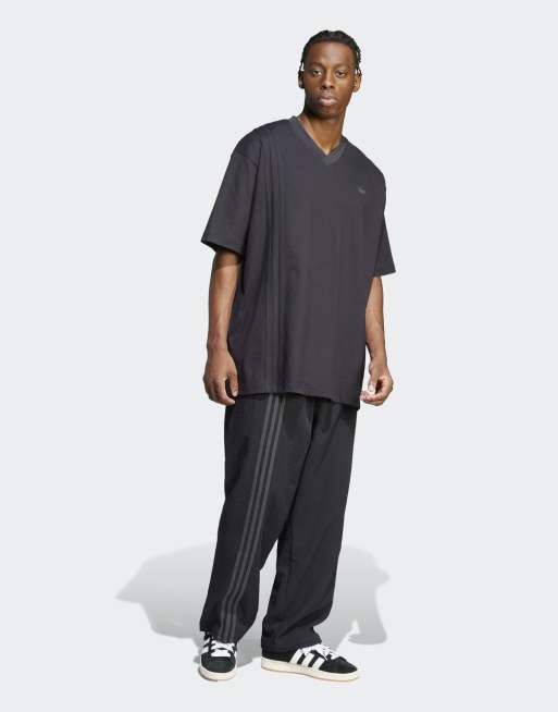 adidas Originals – Front – T-Shirt in Schwarz mit drei Streifen