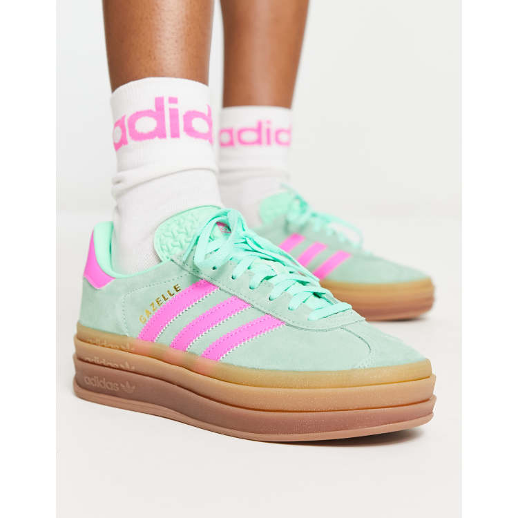 Pink and store green adidas shoes