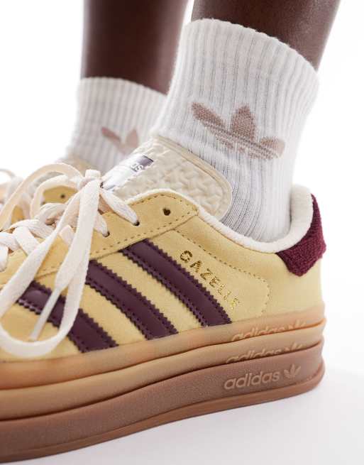 adidas Originals Gazelle Bold Sneakers met plateauzool in zachtgeel en kastanjebruin ASOS