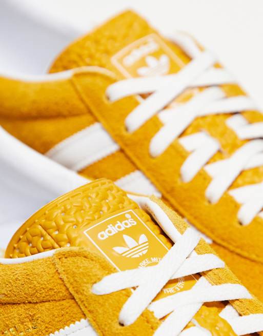 Adidas originals gazelle shop sneakers in mustard yellow