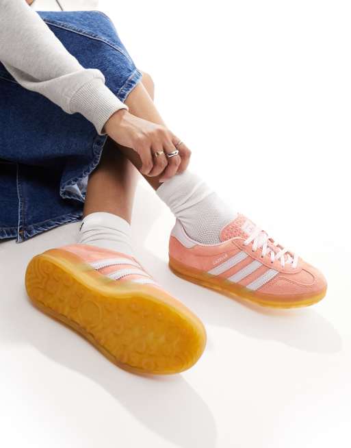 adidas Originals Gazelle Indoor gum sole sneakers in orange and pink