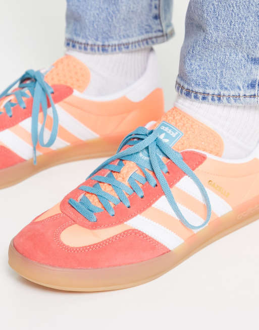 adidas Originals Gazelle Indoor gum sole sneakers in orange and pink