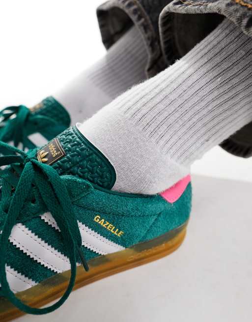 adidas Originals Gazelle Indoor sneakers in dark green with pink heel tab