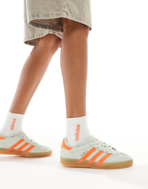 adidas Originals Gazelle Indoor sneakers in light green and orange