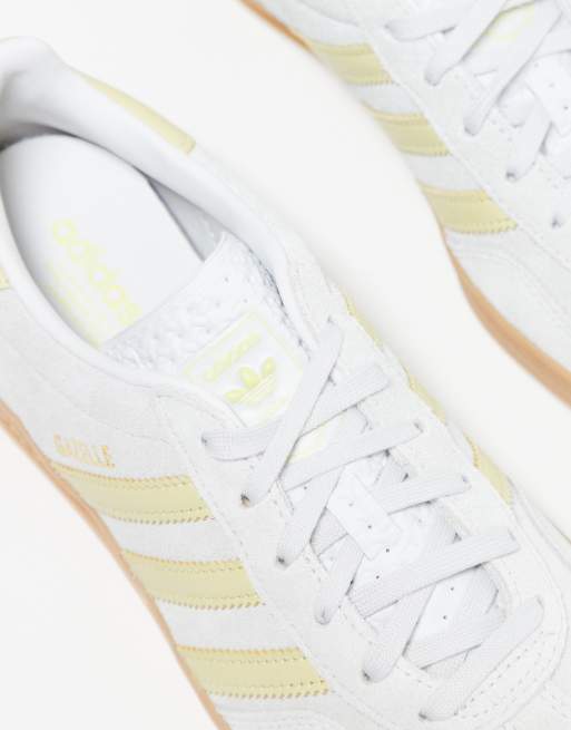 adidas Originals Gazelle Indoor unisex trainers in silver and yellow