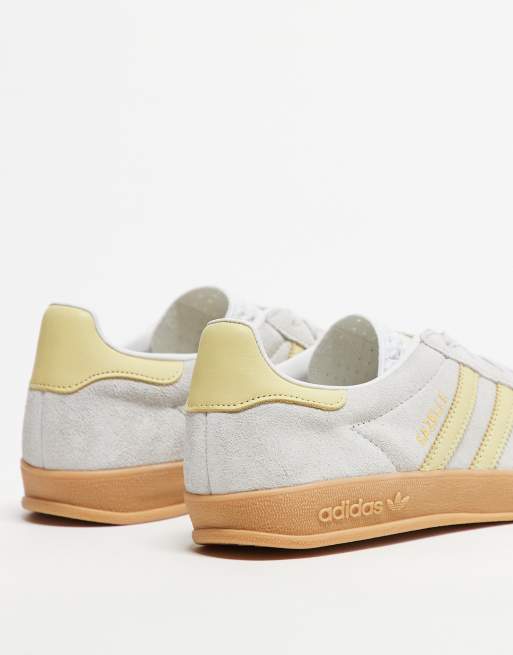 adidas Originals Gazelle Indoor unisex trainers in silver and yellow
