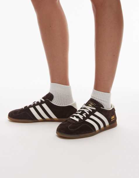 adidas Originals Gazelle lo pro sneakers in brown and white with gum sole - view 1
