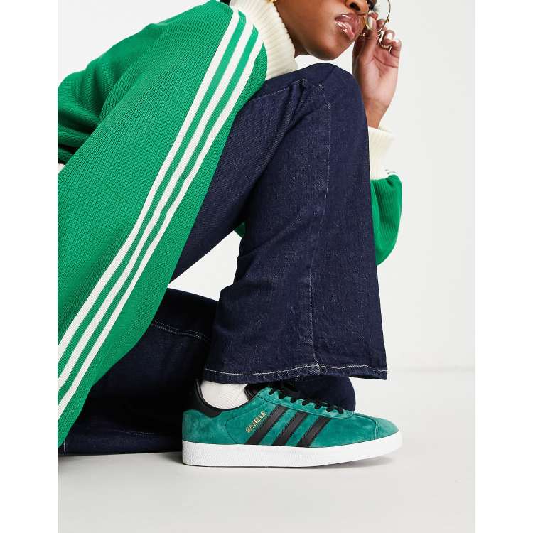 Black adidas with green stripes sale