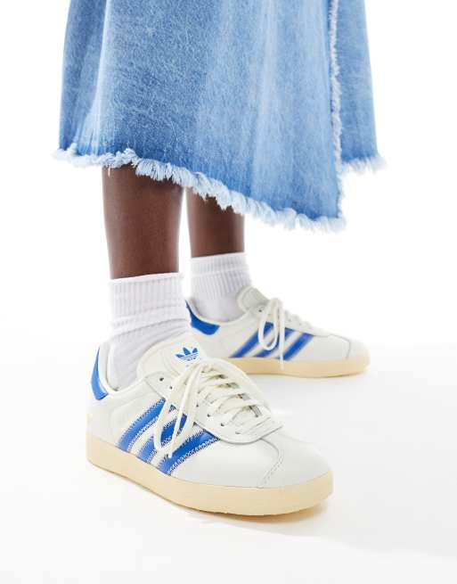adidas Originals Gazelle sneakers in white and blue