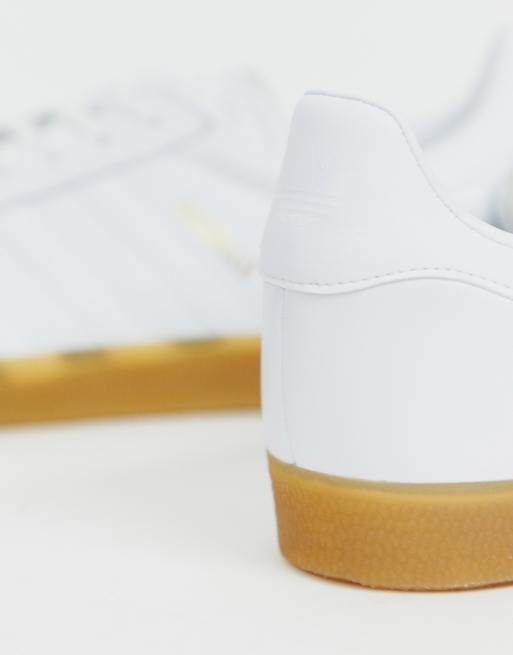 Adidas originals white leather clearance gazelle trainers with gum sole