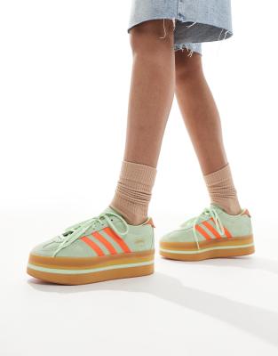 adidas Originals Gazelle stack trainers in green and orange