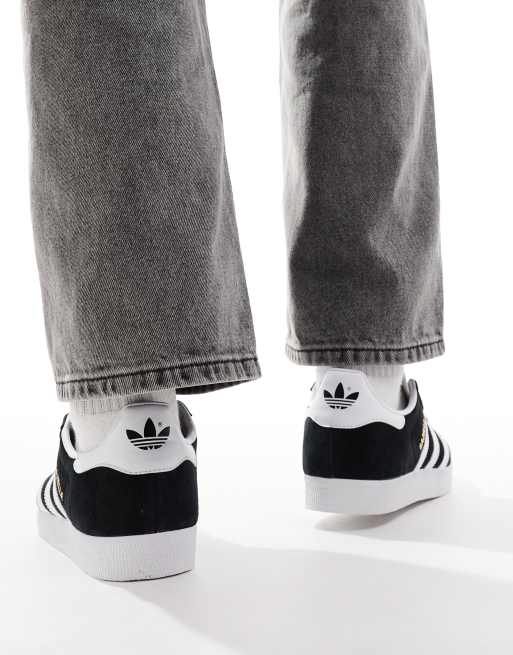 Black and white adidas gazelle mens best sale