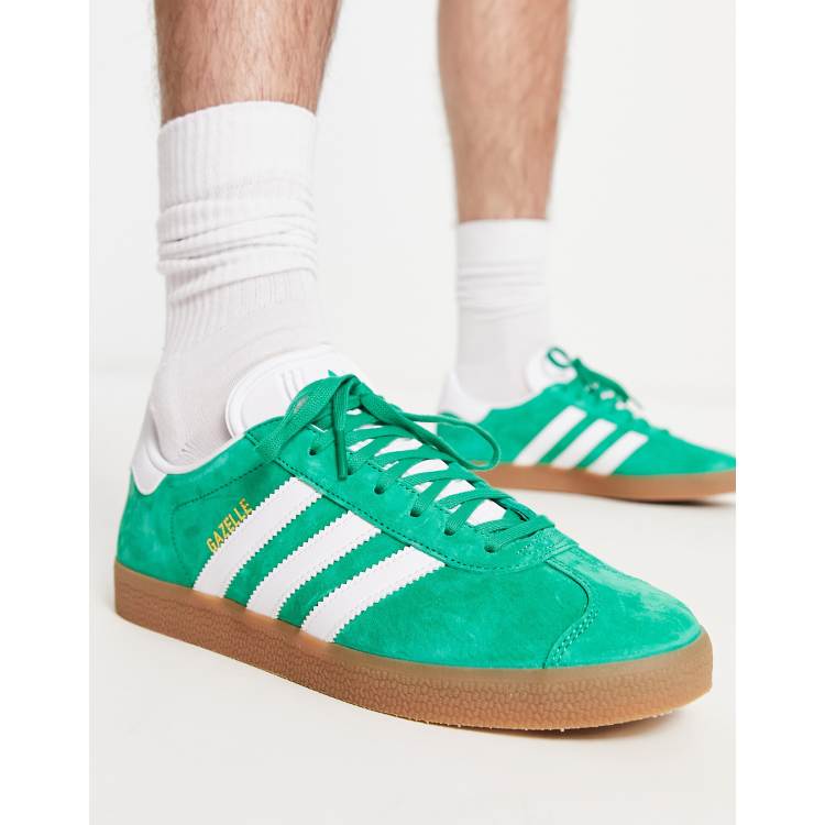 adidas Originals Gazelle trainers in green with gum sole